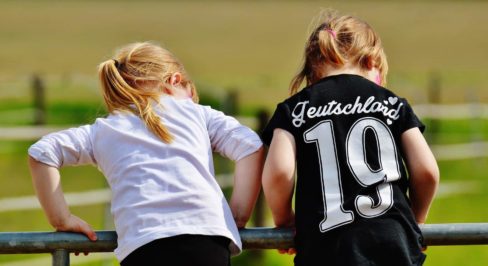 Girls curiously feasting their eyes on nature