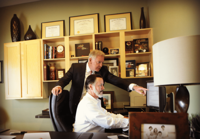 Gregory M. White, CPA with the Hank from Didier Group